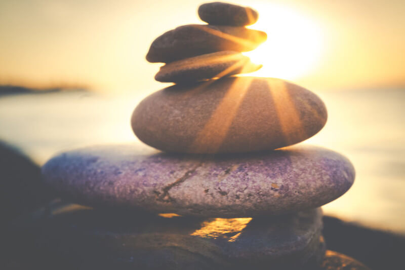 balanced-rocks-at-dawn-on-a-beach