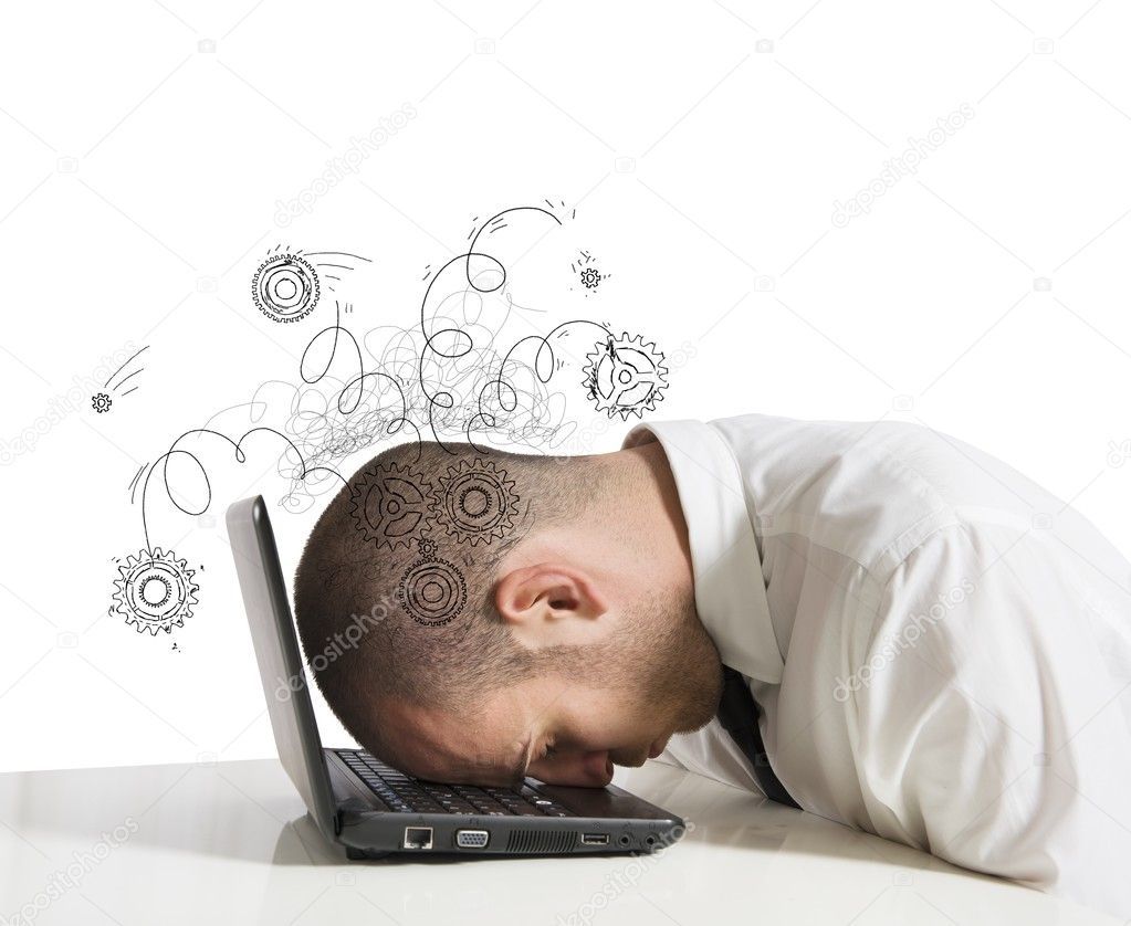 young man with head lying on laptop with illustrations above his head to show how optimizing brain performance prevents brain fog