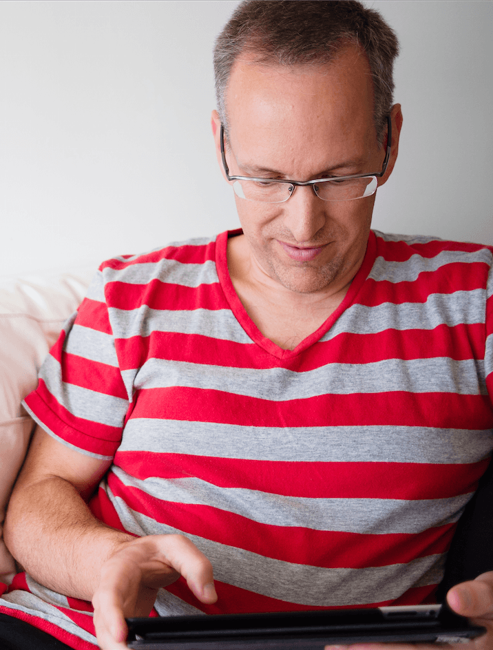 A guy getting therapy online using his tablet.